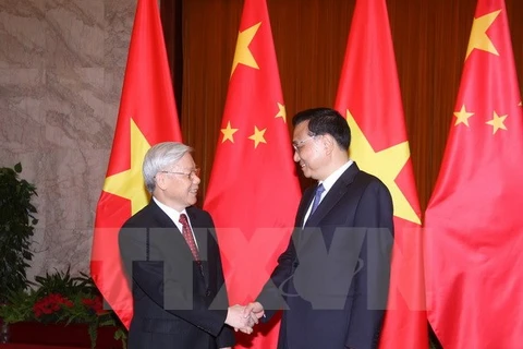 Le Secrétaire général du Parti communiste du Vietnam Nguyen Phu Trong et le Premier ministre chinois Li Keqiang. (Source: VNA)